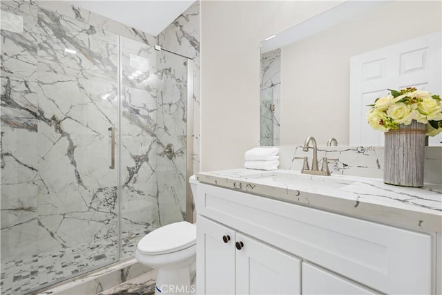 3876 Olmsted Ave, Los Angeles, CA 90008 - bathroom featuring a marble finish shower, marble look tiles, and vanity