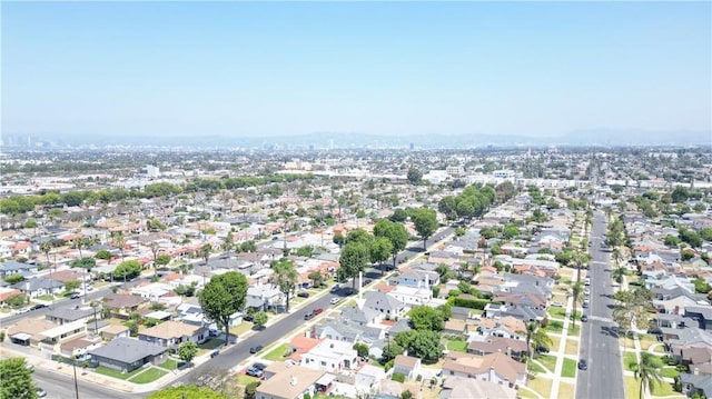 3876 Olmsted Ave, Los Angeles, CA 90008 - aerial overview of property's location featuring nearby suburban area