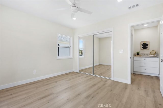 3876 Olmsted Ave, Los Angeles, CA 90008 - unfurnished bedroom featuring light wood finished floors, a closet, recessed lighting, and ceiling fan