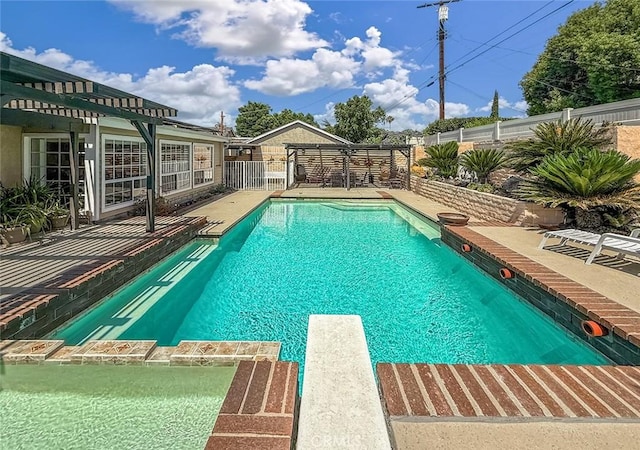 17213 Horace St, Granada Hills, CA 91344 - view of swimming pool with a pergola, a fenced backyard, a patio area, and a diving board
