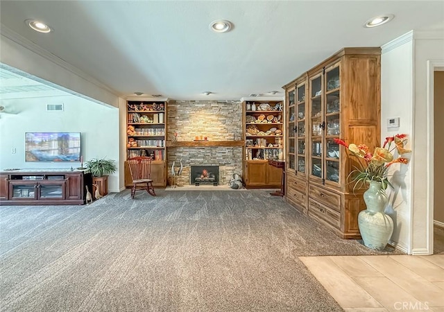 17213 Horace St, Granada Hills, CA 91344 - carpeted living room with a fireplace, recessed lighting, ornamental molding, and built in shelves