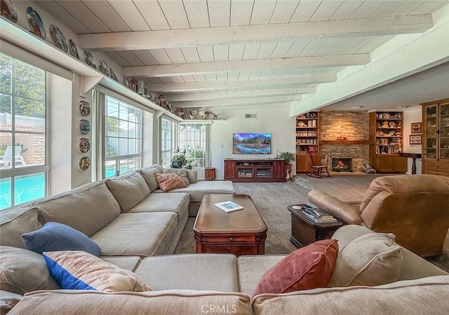 17213 Horace St, Granada Hills, CA 91344 - carpeted living area with plenty of natural light, a fireplace, and a wooden ceiling with exposed beams