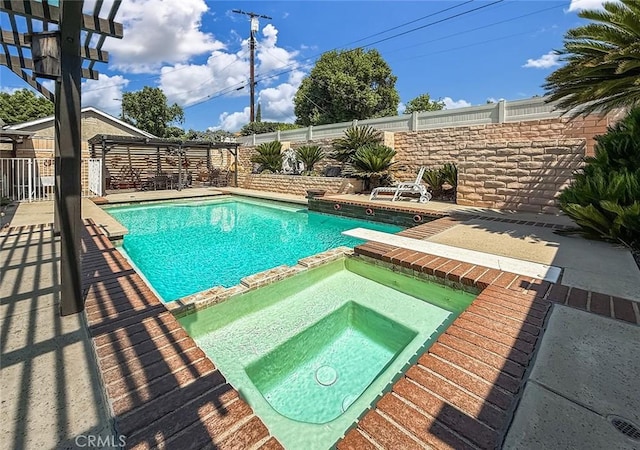 17213 Horace St, Granada Hills, CA 91344 - view of pool featuring a pool with connected hot tub, a fenced backyard, and a patio