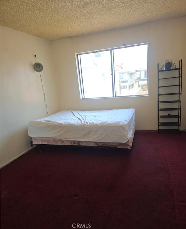 1239 W Rosecrans, Gardena, CA 90247 - carpeted bedroom with multiple windows and a textured ceiling