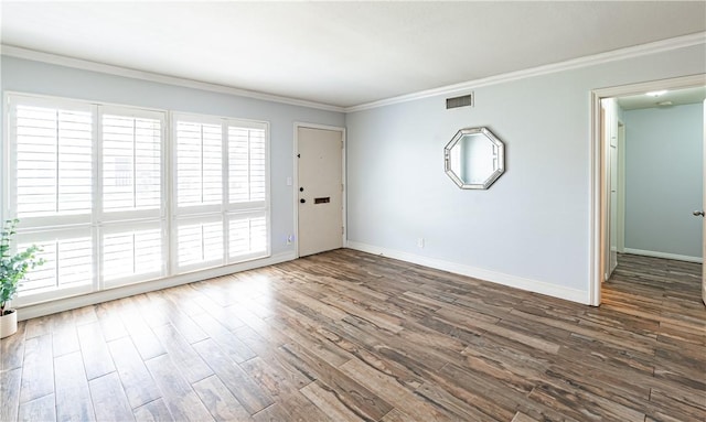 1209 E 1st St, Tustin, CA 92780 - spare room featuring wood finished floors and ornamental molding