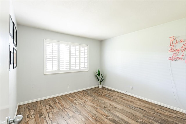 1209 E 1st St, Tustin, CA 92780 - empty room with wood finished floors