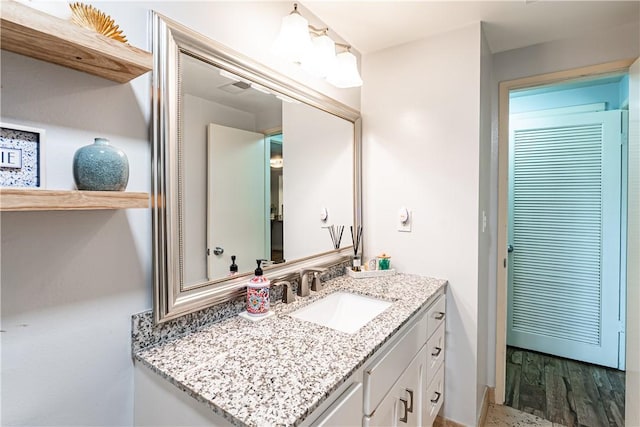 1209 E 1st St, Tustin, CA 92780 - bathroom with vanity and wood finished floors