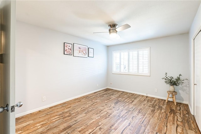1209 E 1st St, Tustin, CA 92780 - unfurnished room featuring wood finished floors and ceiling fan