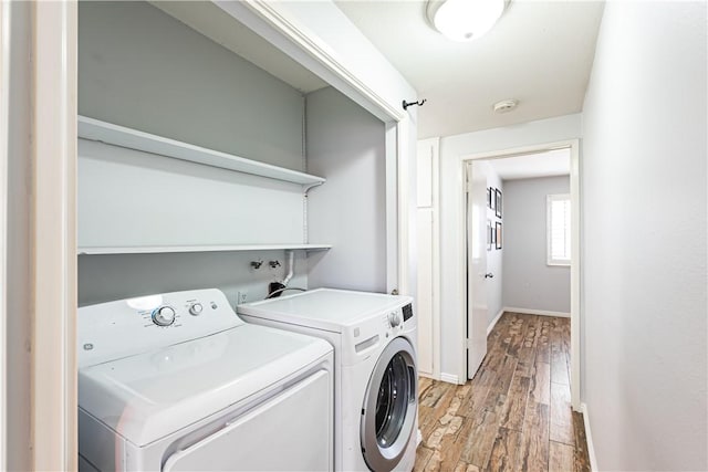 1209 E 1st St, Tustin, CA 92780 - laundry room featuring washer and dryer and light wood-type flooring