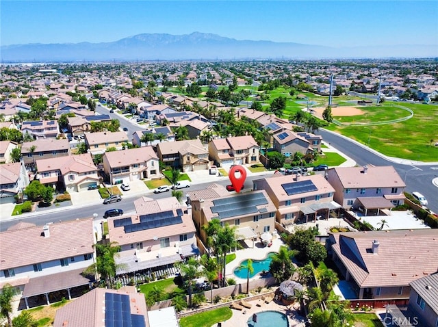 13637 Aspen Leaf Ln, Eastvale, CA 92880 - aerial view of residential area with a mountainous background and a pool
