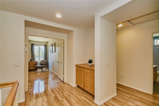 13637 Aspen Leaf Ln, Eastvale, CA 92880 - corridor with light wood-type flooring and recessed lighting