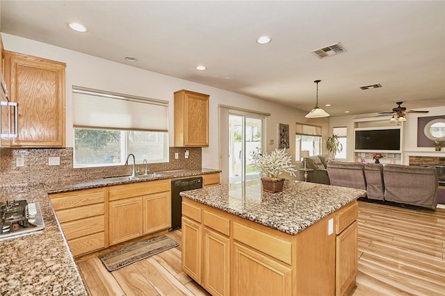 13637 Aspen Leaf Ln, Eastvale, CA 92880 - kitchen featuring light wood-type flooring, a kitchen island, open floor plan, black dishwasher, and recessed lighting