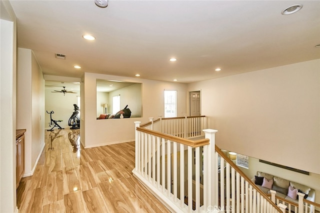13637 Aspen Leaf Ln, Eastvale, CA 92880 - hall featuring an upstairs landing, recessed lighting, and light wood-type flooring