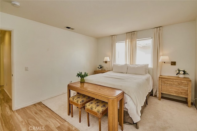 13637 Aspen Leaf Ln, Eastvale, CA 92880 - bedroom with light wood-style flooring and baseboards