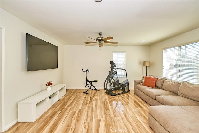 13637 Aspen Leaf Ln, Eastvale, CA 92880 - living room featuring light wood-style flooring and a ceiling fan