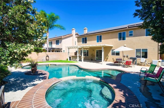 13637 Aspen Leaf Ln, Eastvale, CA 92880 - view of pool featuring a pergola, a patio, and a pool with connected hot tub