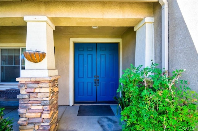 13637 Aspen Leaf Ln, Eastvale, CA 92880 - view of exterior entry featuring stucco siding