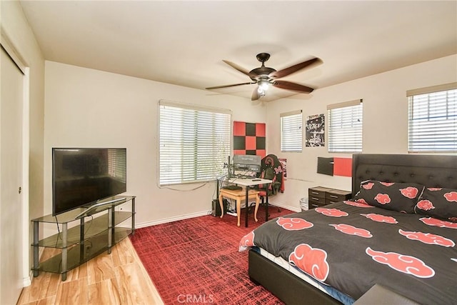 13637 Aspen Leaf Ln, Eastvale, CA 92880 - bedroom with wood finished floors, a closet, and a ceiling fan