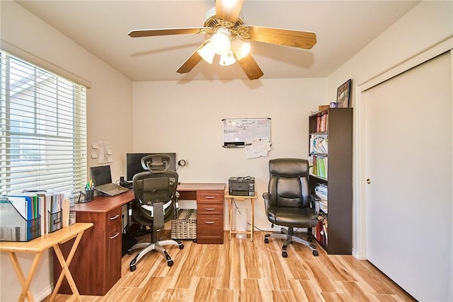 13637 Aspen Leaf Ln, Eastvale, CA 92880 - office area with light wood-type flooring and a ceiling fan
