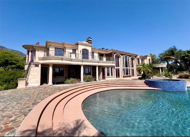 119 Furlong Ln, Bradbury, CA 91008 - view of swimming pool with a pool with connected hot tub and a patio
