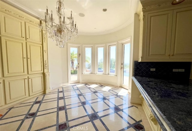 119 Furlong Ln, Bradbury, CA 91008 - kitchen featuring cream cabinetry, a chandelier, inlaid floor details, ornamental molding, and decorative backsplash