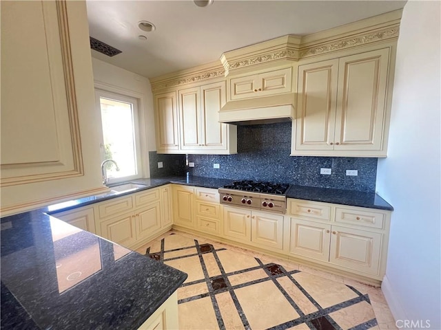 119 Furlong Ln, Bradbury, CA 91008 - kitchen with cream cabinets, stainless steel gas cooktop, decorative backsplash, and custom exhaust hood