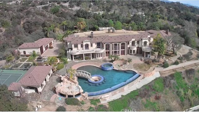 119 Furlong Ln, Bradbury, CA 91008 - rear view of property featuring a pool with connected hot tub