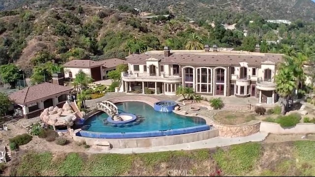 119 Furlong Ln, Bradbury, CA 91008 - view of swimming pool with a patio and a pool with connected hot tub
