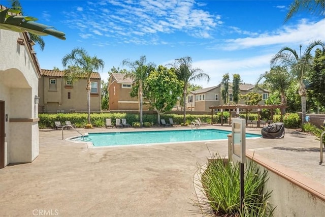 16202 Orion Ave, Chino, CA 91708 - community pool with a residential view, a patio, and a pergola