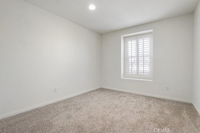 16202 Orion Ave, Chino, CA 91708 - carpeted empty room with baseboards and recessed lighting