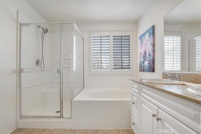 16202 Orion Ave, Chino, CA 91708 - bathroom featuring a stall shower, a garden tub, and double vanity