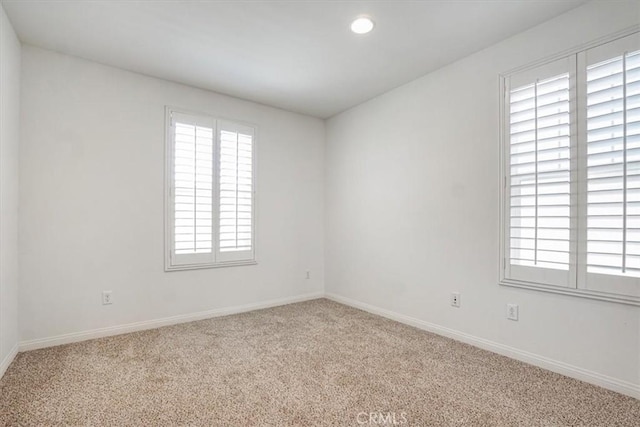 16202 Orion Ave, Chino, CA 91708 - unfurnished room with healthy amount of natural light, carpet flooring, and recessed lighting
