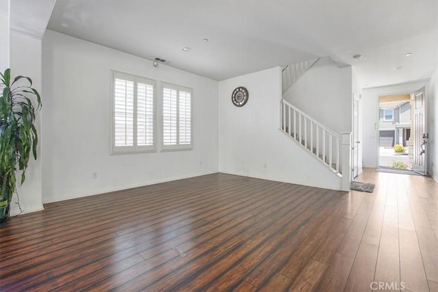 16202 Orion Ave, Chino, CA 91708 - unfurnished living room featuring wood finished floors and stairs