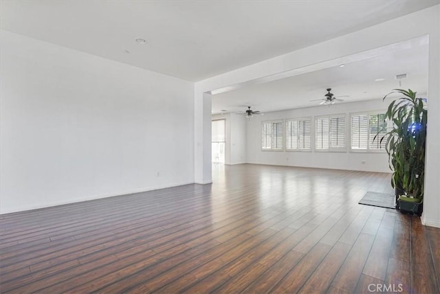 16202 Orion Ave, Chino, CA 91708 - unfurnished living room with dark wood-style flooring and a ceiling fan