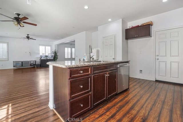 16202 Orion Ave, Chino, CA 91708 - kitchen with stainless steel dishwasher, dark wood-style flooring, a ceiling fan, plenty of natural light, and recessed lighting