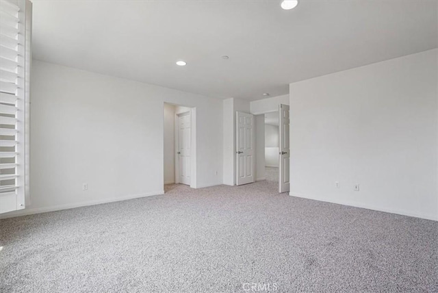16202 Orion Ave, Chino, CA 91708 - empty room with light colored carpet and recessed lighting