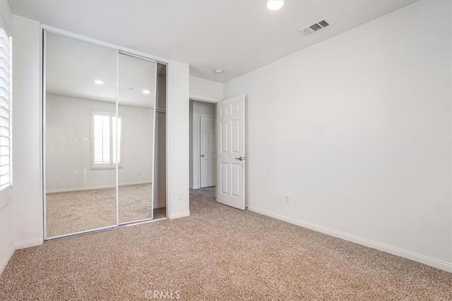 16202 Orion Ave, Chino, CA 91708 - unfurnished bedroom with carpet flooring, a closet, and recessed lighting