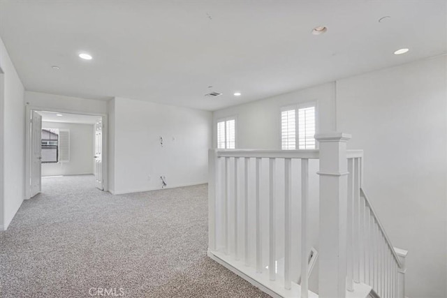 16202 Orion Ave, Chino, CA 91708 - hall with an upstairs landing, carpet flooring, and recessed lighting