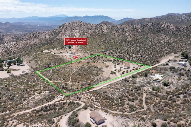 5935 Monte Vista Rd, Phelan, CA 92371 - view of rural area with a mountain backdrop and property parcel outlined