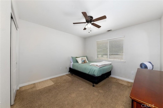 5935 Monte Vista Rd, Phelan, CA 92371 - carpeted bedroom with a closet and a ceiling fan