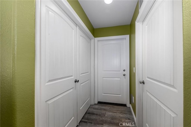 5935 Monte Vista Rd, Phelan, CA 92371 - hallway featuring dark wood-type flooring