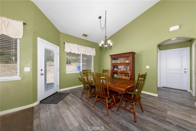 5935 Monte Vista Rd, Phelan, CA 92371 - dining room with arched walkways, wood finished floors, a chandelier, and high vaulted ceiling