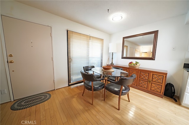 18560 Vanowen St Unit 27, Reseda, CA 91335 - dining area featuring light wood-type flooring
