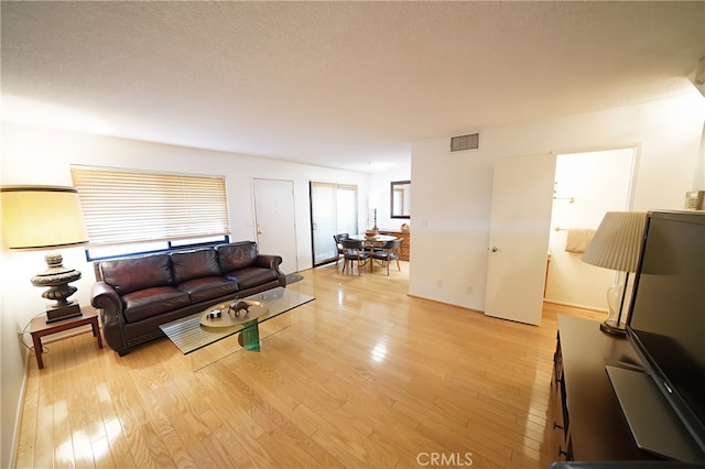 18560 Vanowen St Unit 27, Reseda, CA 91335 - living area with light wood finished floors