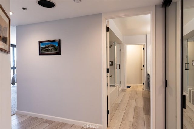222 Monterey Rd Unit 1205, Glendale, CA 91206 - hallway featuring light wood finished floors and recessed lighting