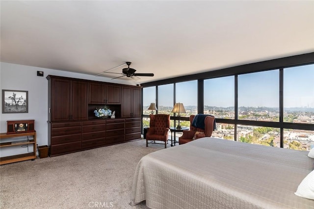 222 Monterey Rd Unit 1205, Glendale, CA 91206 - bedroom with light colored carpet and a ceiling fan