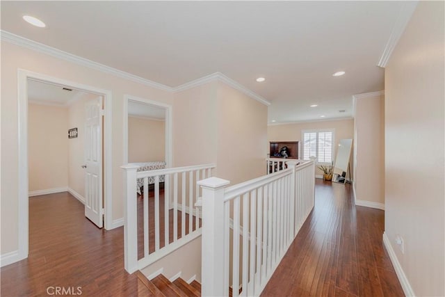 1528 W Delvale St, West Covina, CA 91790 - hallway with an upstairs landing, dark wood-style flooring, ornamental molding, and recessed lighting
