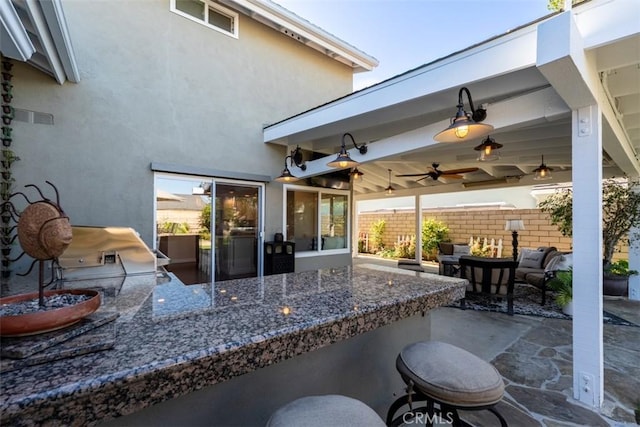 20072 Mural Cir, Huntington Beach, CA 92646 - view of patio / terrace featuring an outdoor kitchen, a ceiling fan, and outdoor lounge area