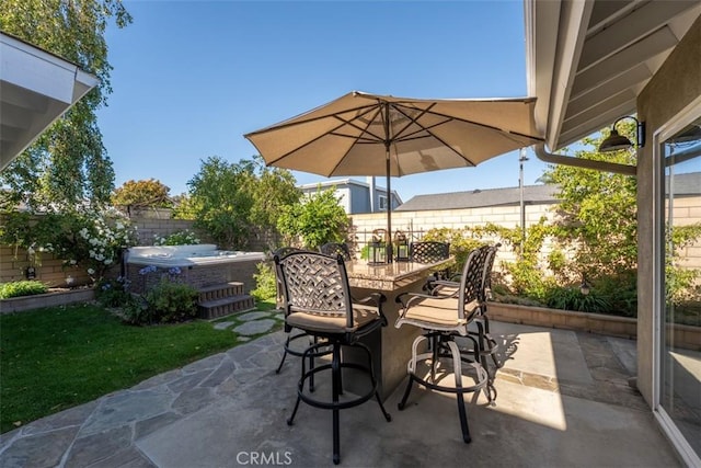 20072 Mural Cir, Huntington Beach, CA 92646 - fenced backyard with a hot tub, a patio, and area for grilling