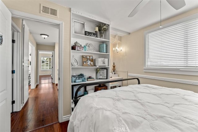 20072 Mural Cir, Huntington Beach, CA 92646 - bedroom with dark wood-style flooring and ceiling fan